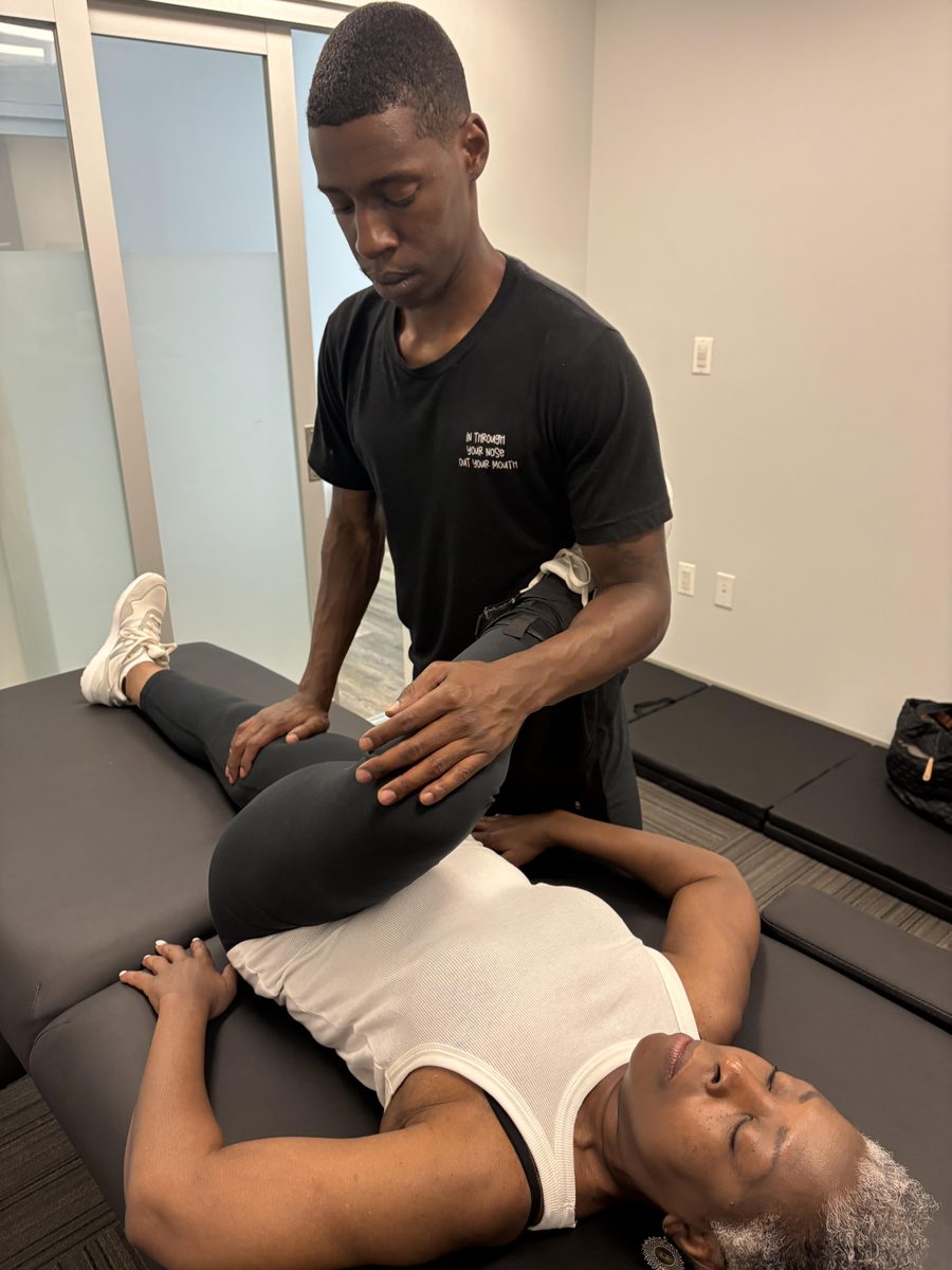 Assisted stretching session at Never Stagnant Training